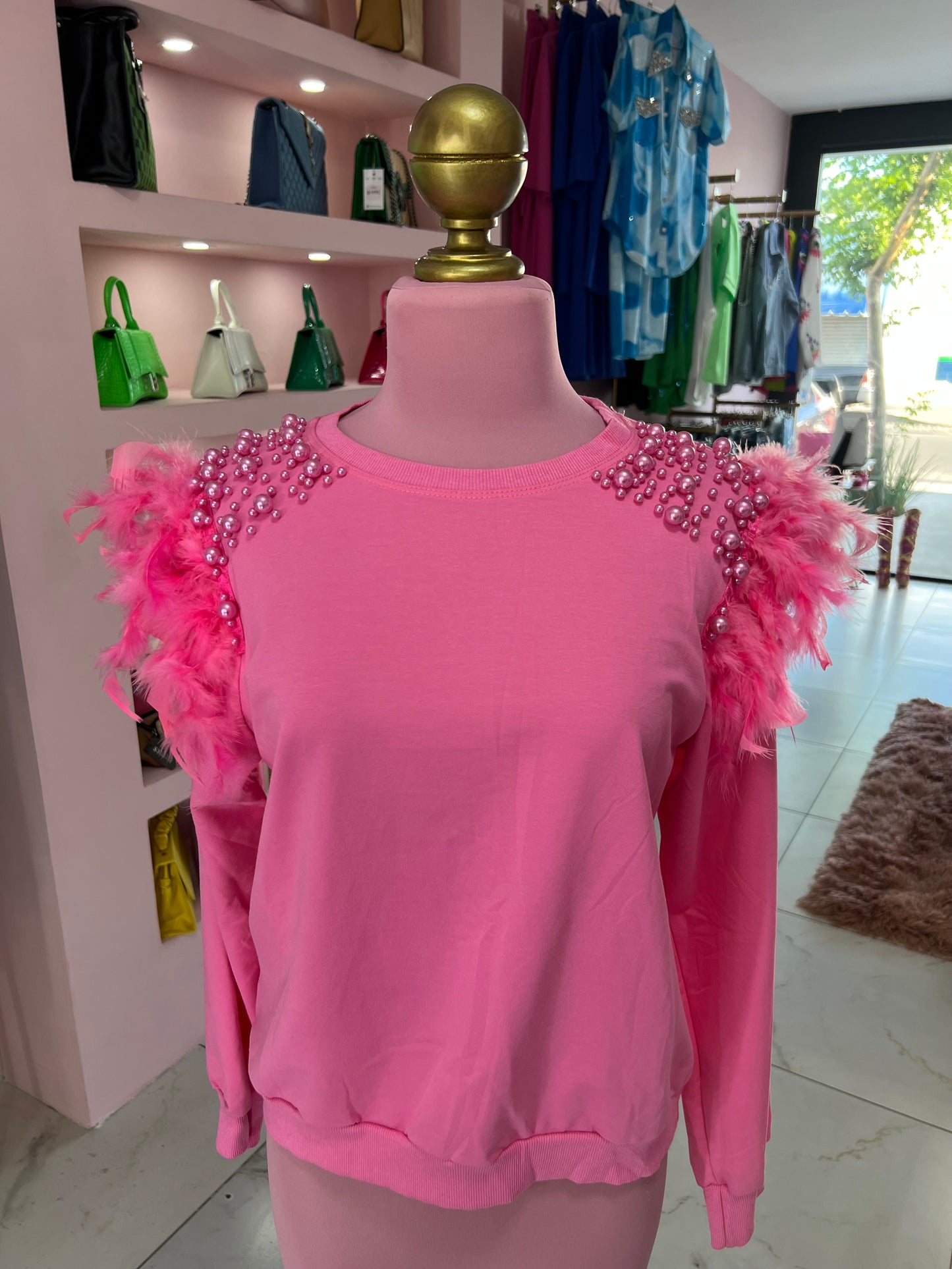 Suéter ligero plumas